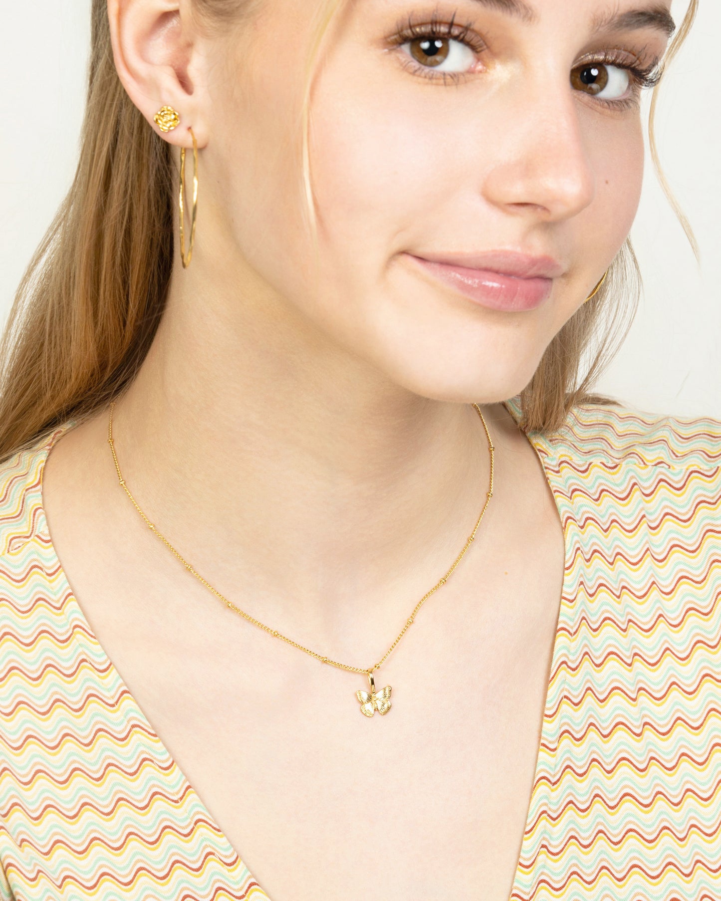 BUTTERFLY CHARM NECKLACE