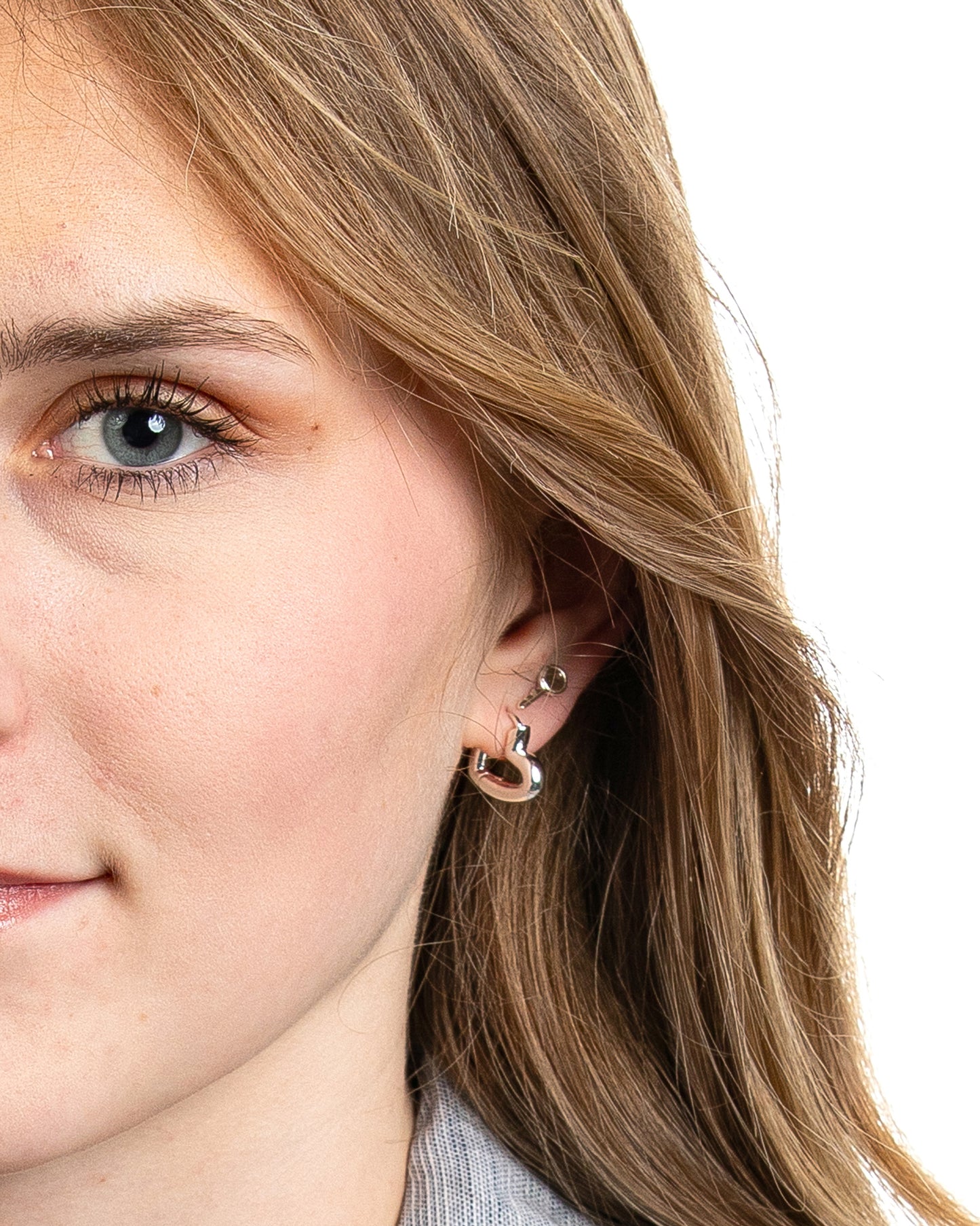 OPEN HEART HUGGIE EARRINGS