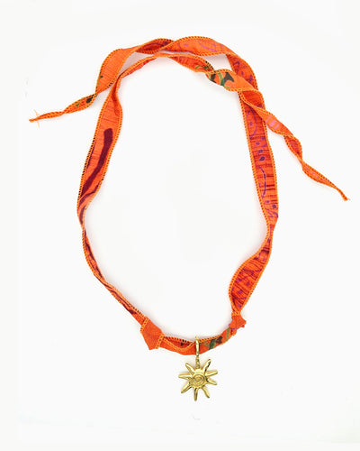 Sunset-orange silk ribbon necklace with gold-tone Sunray Clip-On Charm